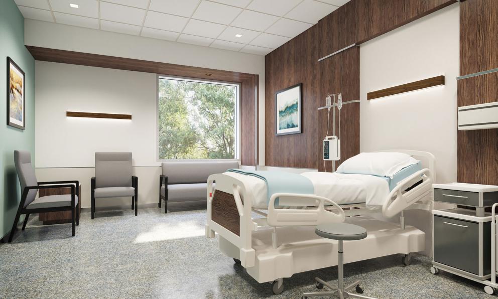 Patient room with wood wall and Walnut Seem 1 wall mount luminaires over chair and patient bed