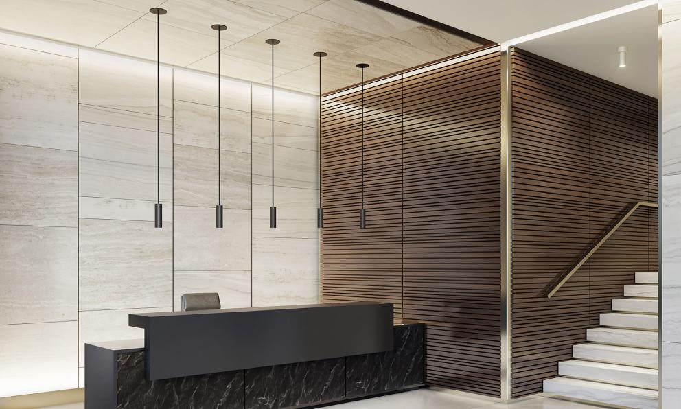 ID+ 2.5" Pure Cylinders 8" height in black over a reception desk