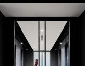ID+ Downlights Cylinders Elevator Corridor