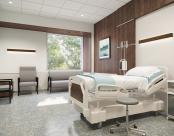 Patient room with wood wall and Walnut Seem 1 wall mount luminaires over chair and patient bed